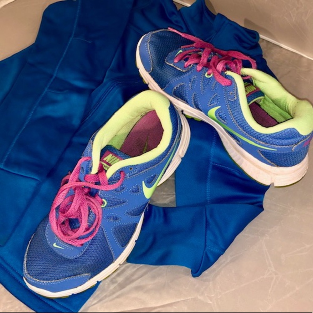 Blue, pink, and lime green Nike sneakers